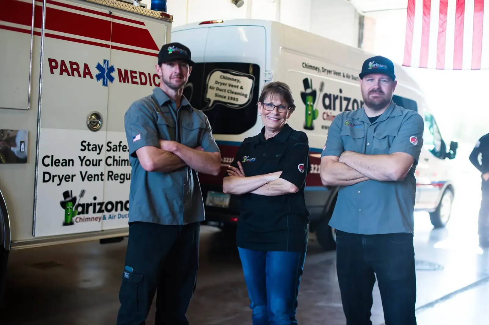 Becky Derendal with Mesa Fire and Medical crew members in front of a paramedic unit