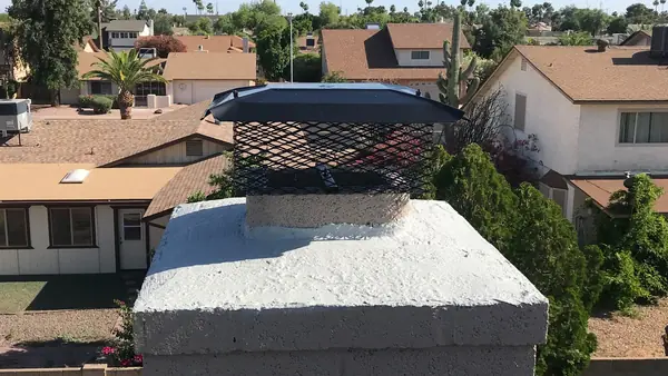Chimney cap on a masonry chimney