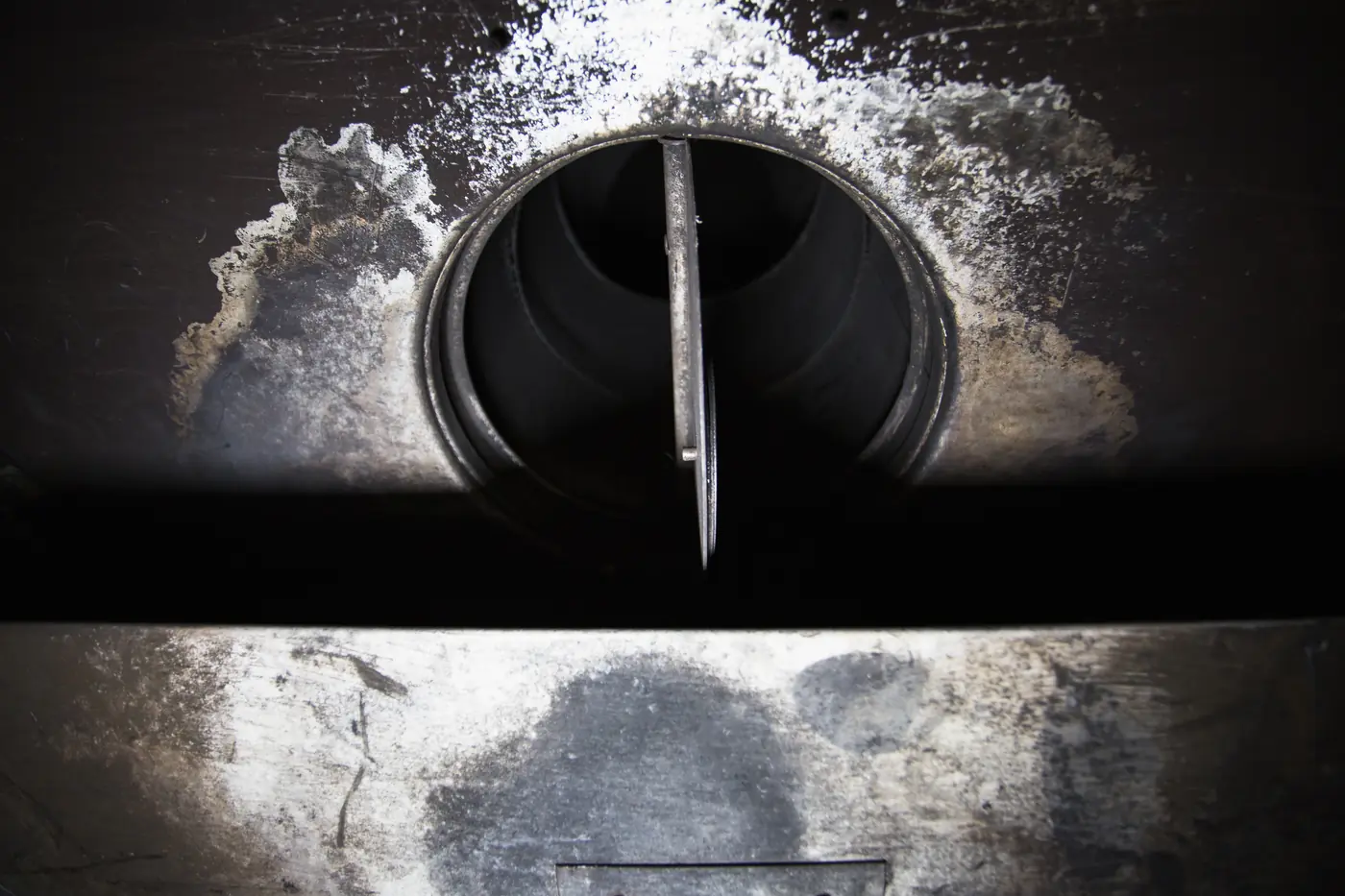 The same chimney flue and damper after cleaning