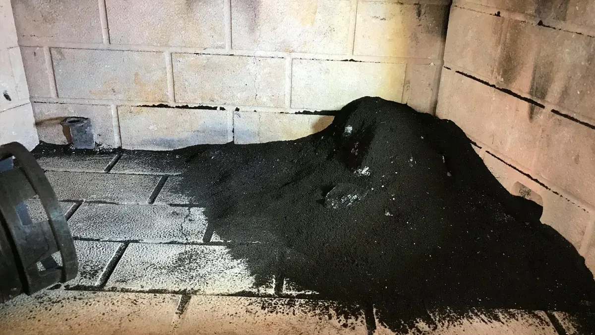Pile of creosote and soot removed from a chimney
