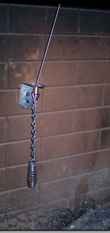 Damper control cable and handle inside the firebox