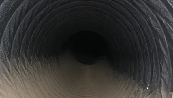 Dusty air duct before cleaning