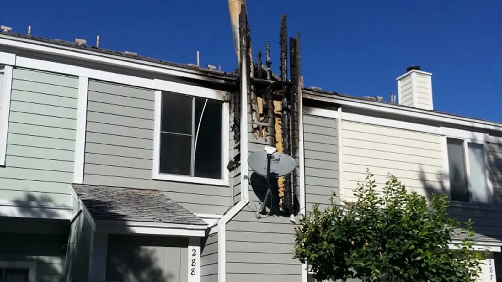 Home exterior after a chimney fire