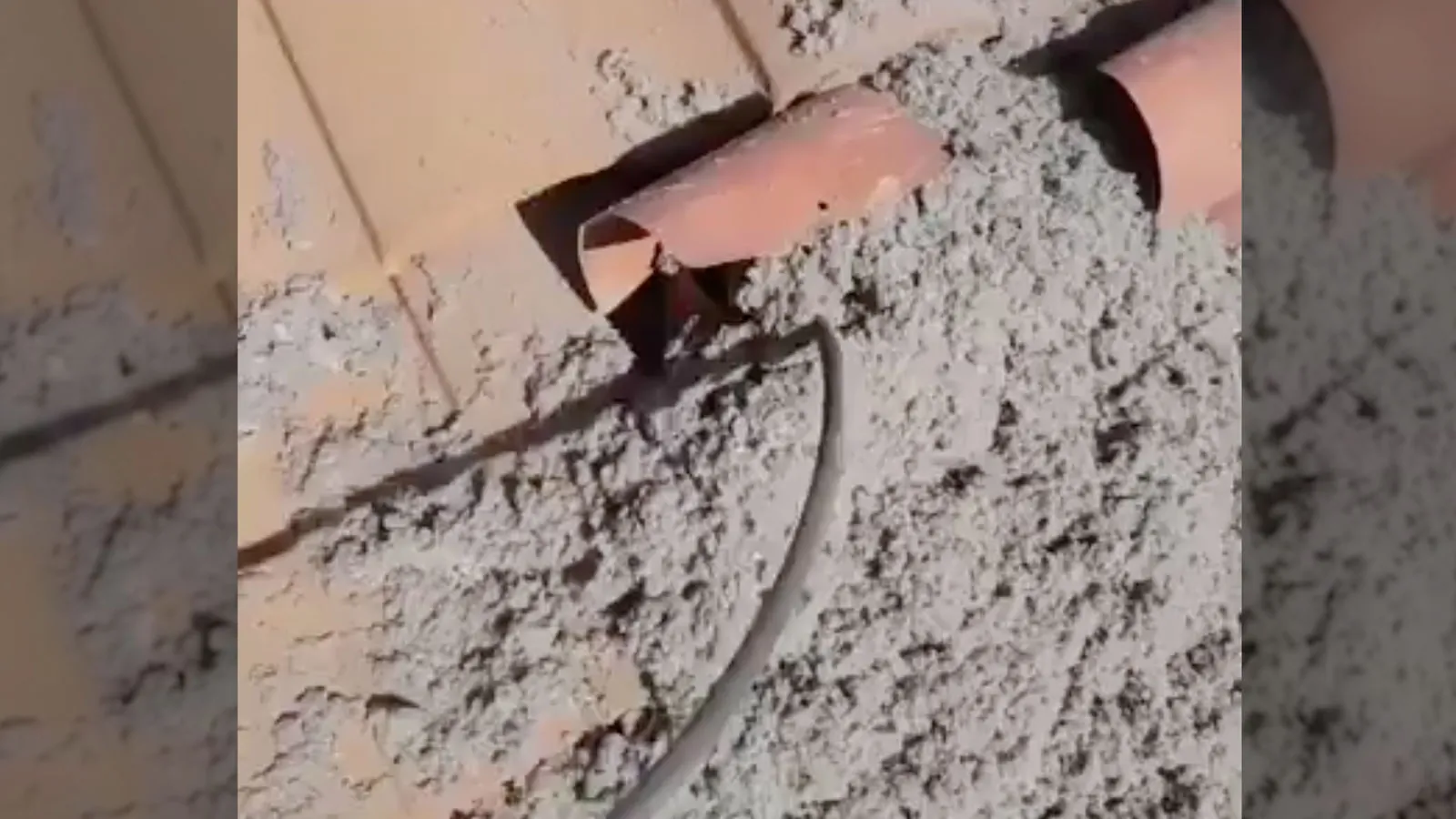 Rooftop dryer vent with lint around the hood